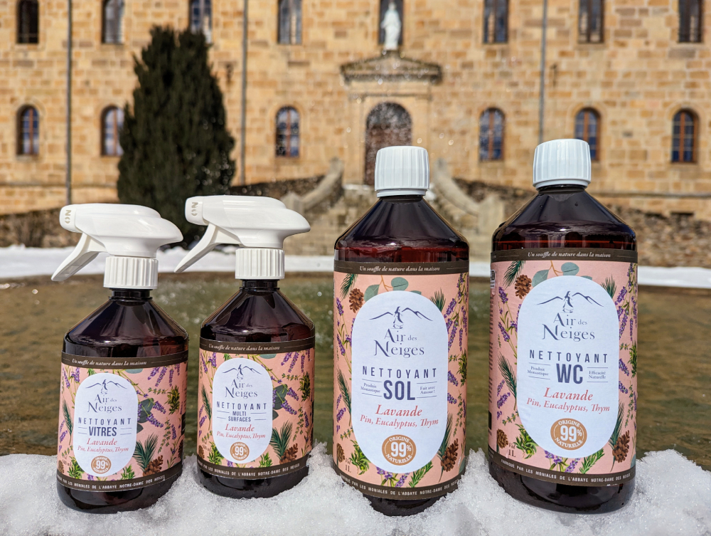 Air des Neiges cleaning products. Air des Neiges, 99.9% natural cleaning products. In this photo are featured products in the scent of lavender with touches of pine, eucalyptus, and thyme. From left to right, a window cleaner, a multi-surface cleaner, a floor and a bathroom cleaner (Courtesy of Abbaye Notre-Dame des Neiges)